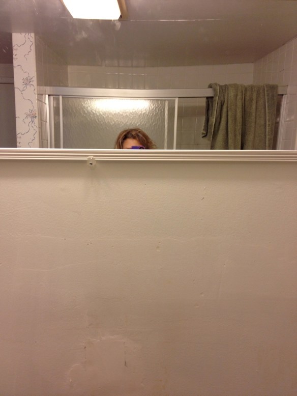 Here's what happened when Jeff hung a temporary mirror in our bathroom.