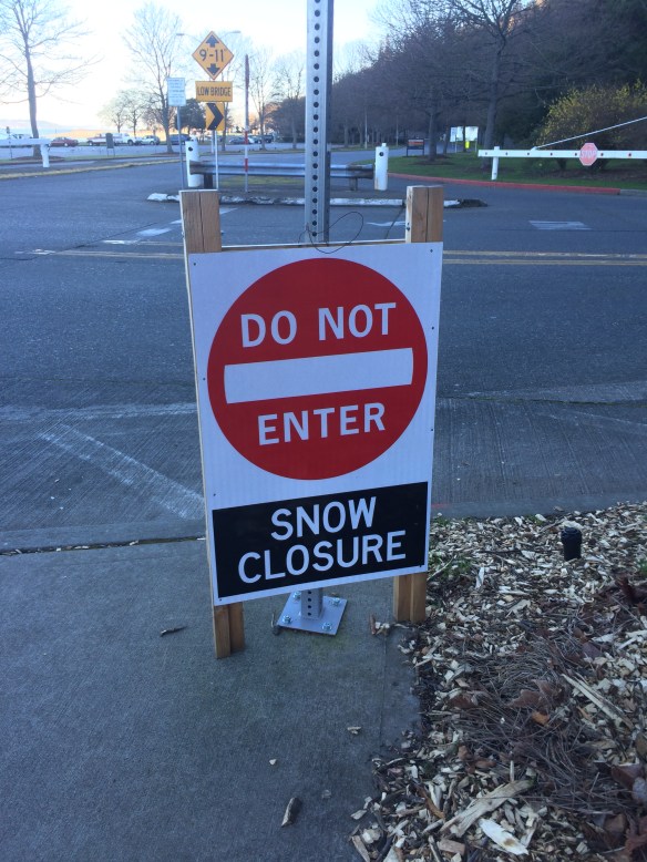 Seen on a dry, 60 degree Seattle day. Was Boston selling off its surplus signs?